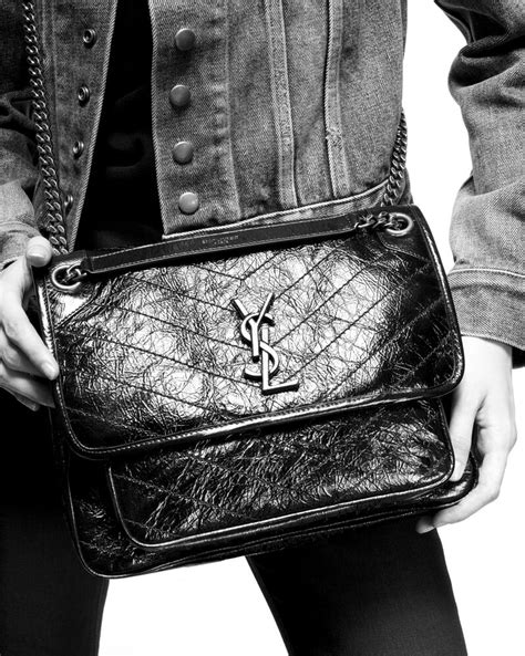 ysl changing bag|More.